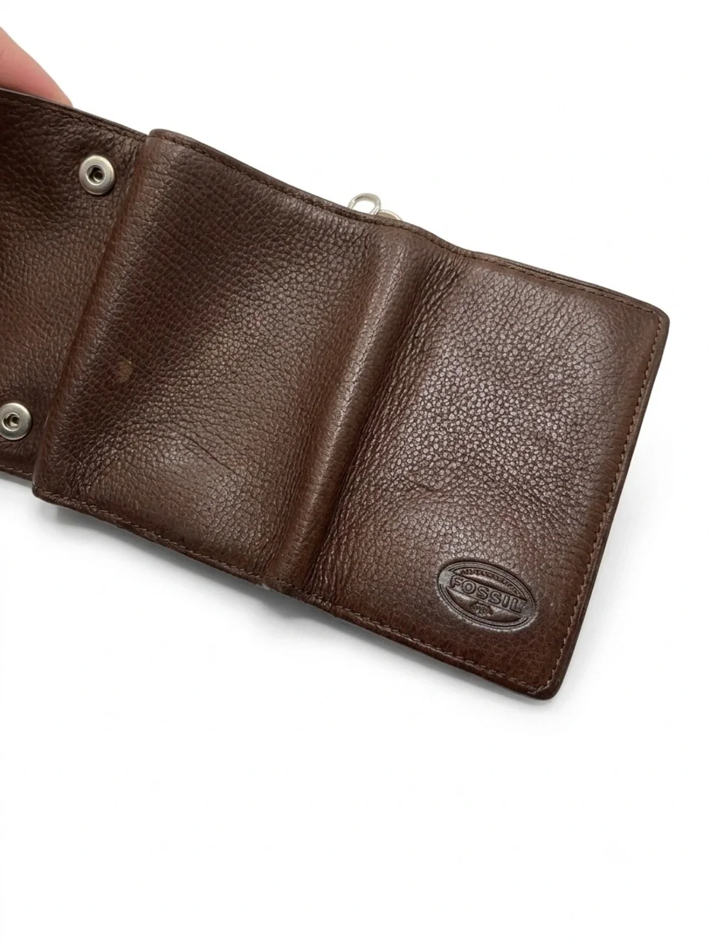 leather Fossil tri-fold key holder wallet featuring six metal key hooks.